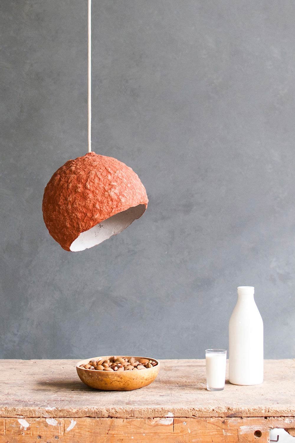 red globe pendant light above the table