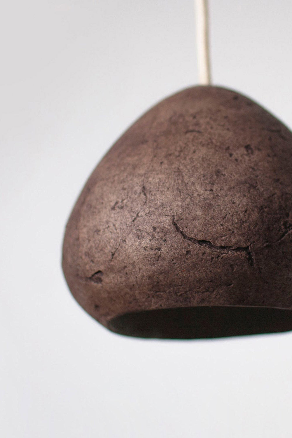 detail of the nursery pendant lamp in brown colour