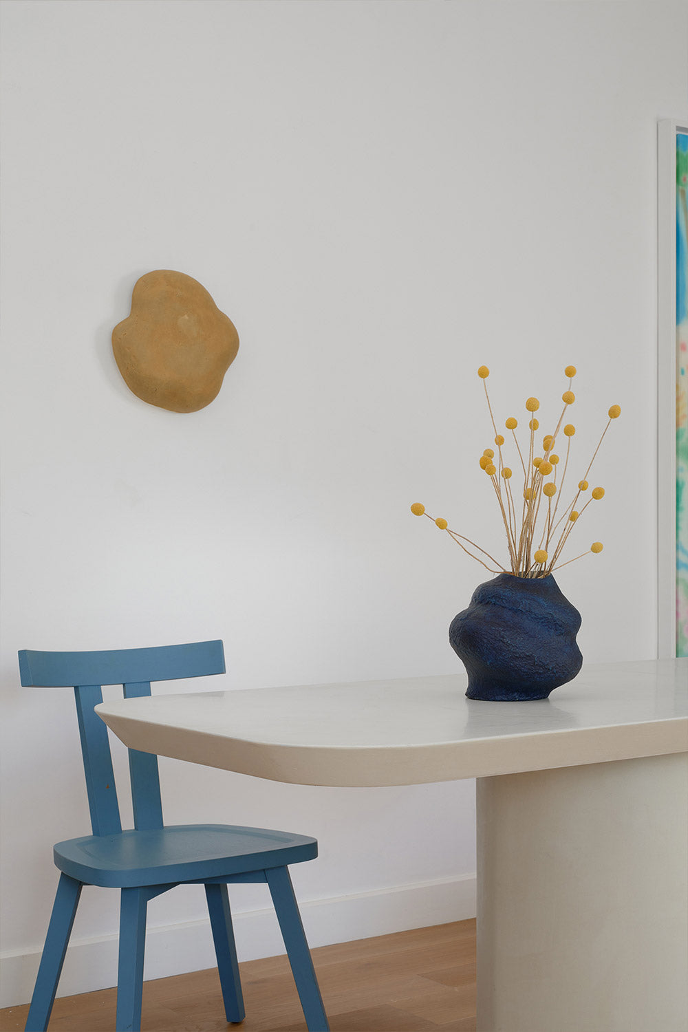 blue vase for decoration on the table with dry flowers