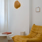 decorative yellow wall sconce in the living room