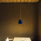 cute small eco lamp hanging in the dining room