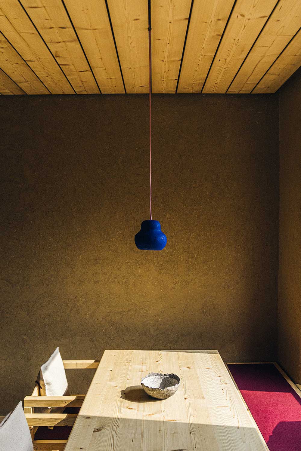 cute small eco lamp hanging in the dining room