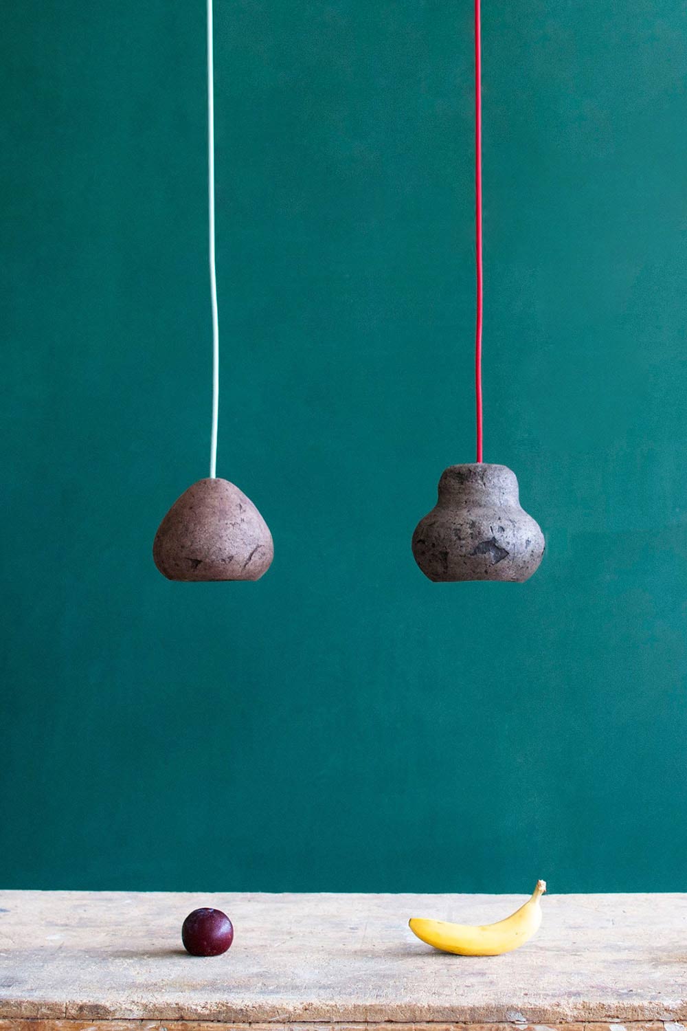 two small eco lamps made with paper mache above the table