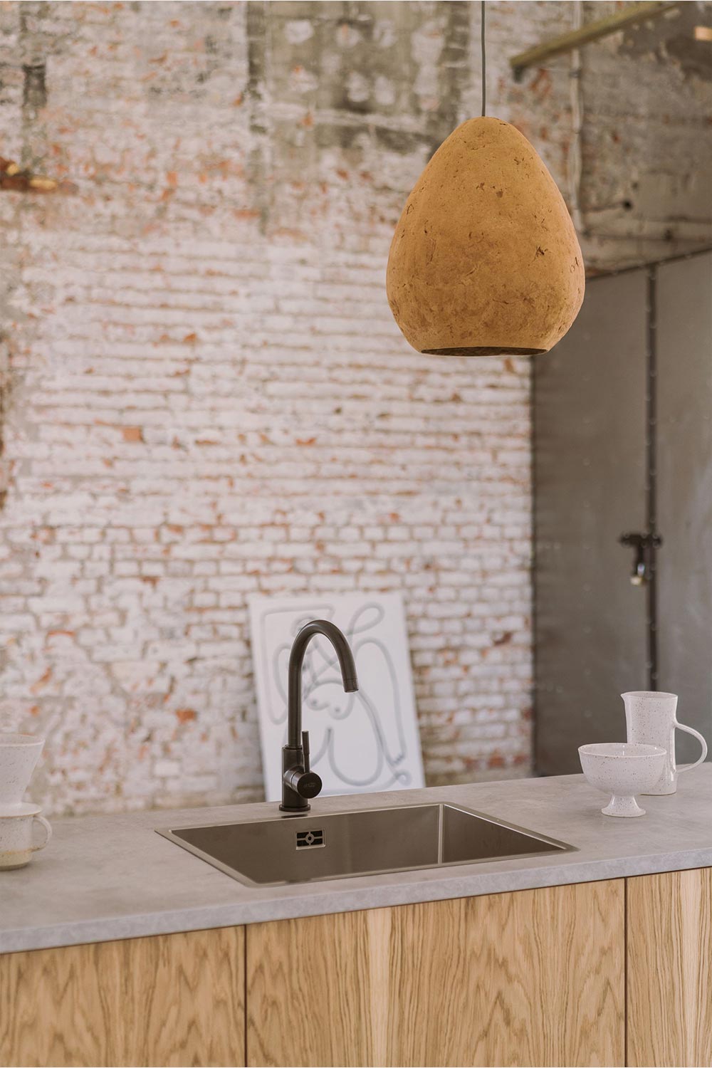 hanging light morphe above the kitchen island