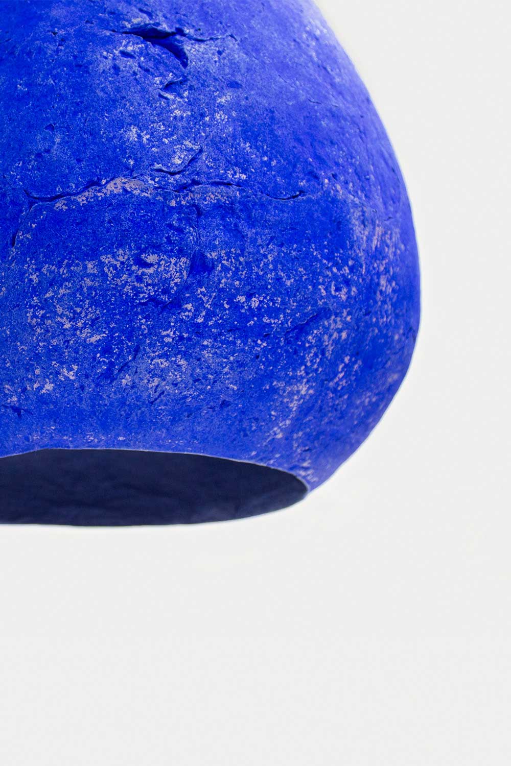 detail of the texture of ultramarine blue hanging light morphe