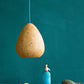 yellow hanging light morphe above the table