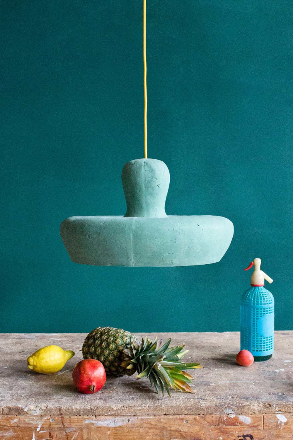 Light pendant Morphe in green in the kitchen