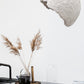 grey paper lamp globe above the kitchen island