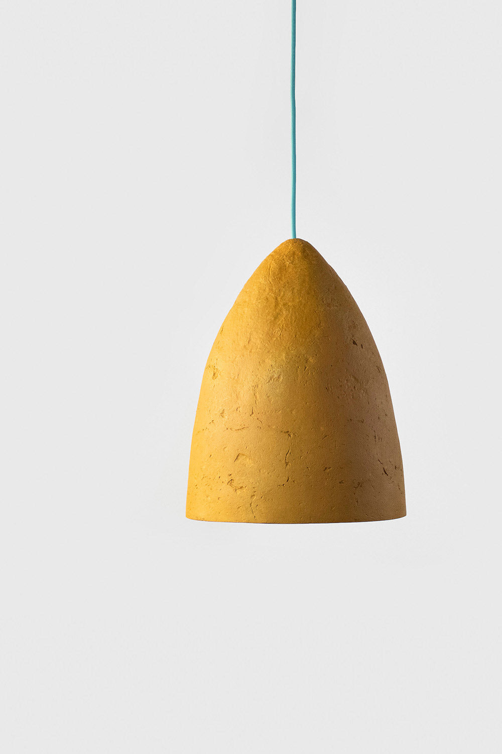 yellow paper mache light conica