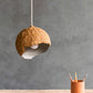 paper mache planet lamp above the table