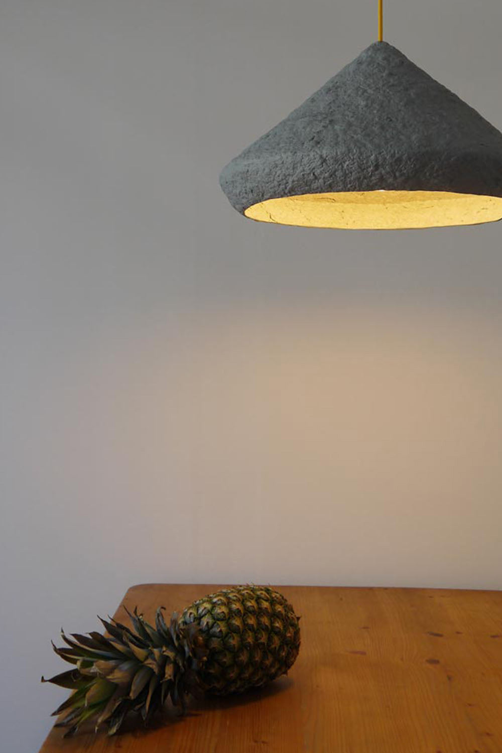 grey paper pulp lamp mizuko above the table